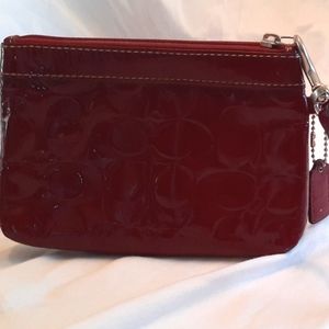 Coach patent leather wristlet burgundy